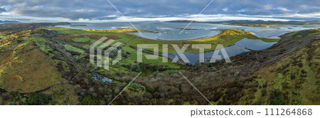 Aerial view of Castlegoland hill by Portnoo - County Donegal, Ireland. Aerial view of Castlegoland hill by Portnoo - County Donegal, Ireland. 111264868