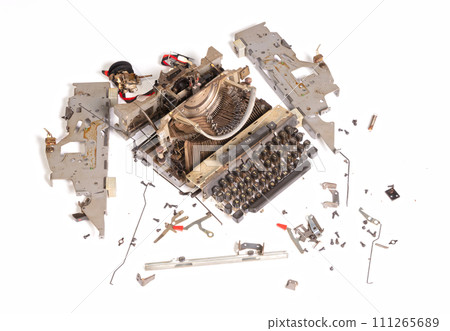 Broken metal typewriter, vintage object 111265689