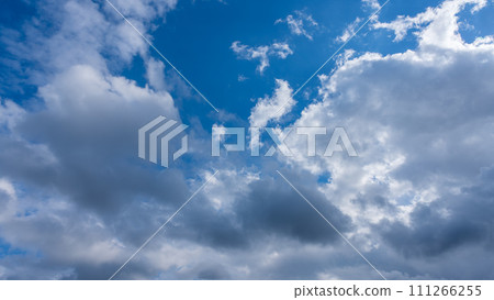 many clouds flowing in the blue sky 111266255