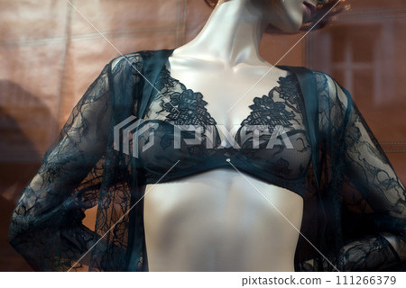 Closeup of black bra on mannequin in a fashion store showroom 111266379
