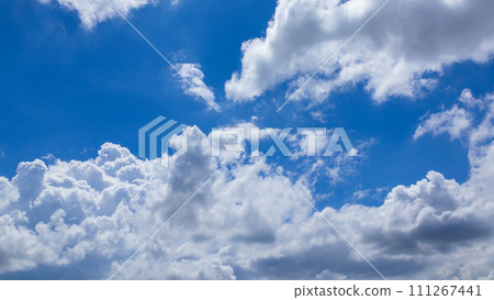 Cumulonimbus clouds appearing in the blue sky Cumulonimbus clouds appearing in the blue sky 111267441