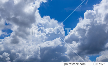 Cumulonimbus clouds appearing in the blue sky 111267475