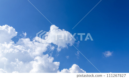 Cumulonimbus clouds appearing in the blue sky Cumulonimbus clouds appearing in the blue sky 111267827