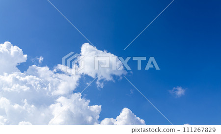 Cumulonimbus clouds appearing in the blue sky Cumulonimbus clouds appearing in the blue sky 111267829