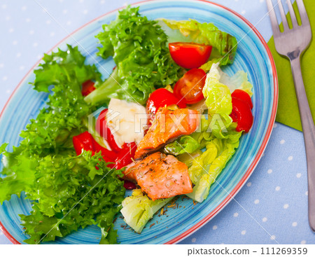 Grilled trout with vegetables Grilled trout with vegetables 111269359