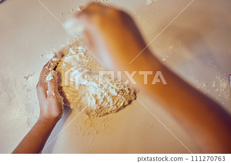 hands preparing dough for pizza. 111270763