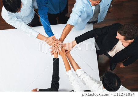 Group of diverse office worker join hand together in office. Prudent Group of diverse office worker join hand together in office. Prudent 111271054