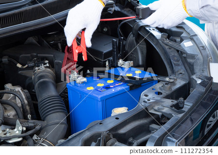 Car battery trouble (mechanic with alligator clip) 111272354