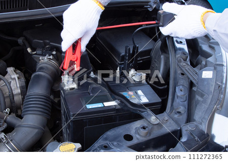 Car battery trouble (mechanic with alligator clip) Car battery trouble (mechanic with alligator clip) 111272365