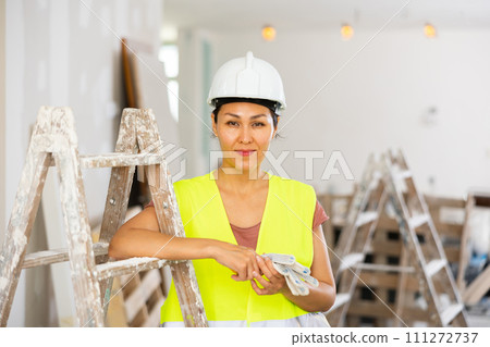 Portrait of asian woman builder 111272737
