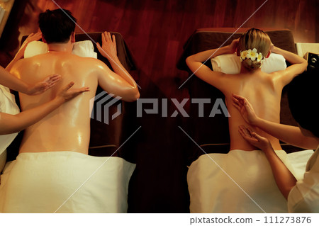 Top view couple customer enjoying relaxing anti-stress massage. Quiescent 111273876