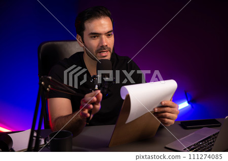 Broadcaster talking to listener with script to educate in psychology. Surmise. Broadcaster talking to listener with script to educate in psychology. Surmise. 111274085