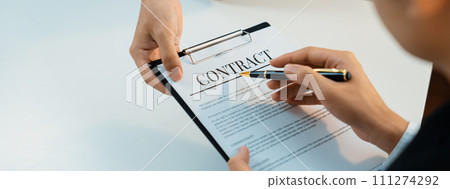 Business executive signing contract agreement document. Shrewd Business executive signing contract agreement document. Shrewd 111274292