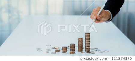 Growth coin stack symbolizing business investment. Shrewd 111274370