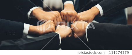 Office worker team stacking hand together symbolize successful teamwork. Shrewd 111274379