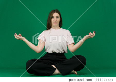 Young Beautiful Woman sitting on the floor 111274785