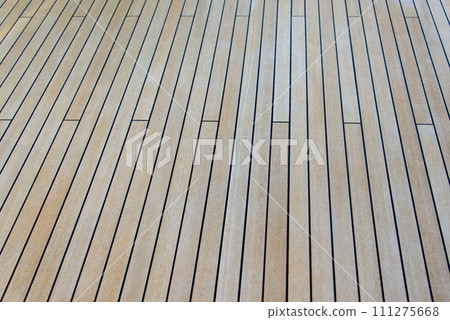 Teak wood deck texture background. Wooden deck on super yacht. Yachting concept. Teak wood deck texture background. Wooden deck on super yacht. Yachting concept. 111275668
