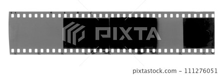 Strip of old exposed celluloid film 111276051