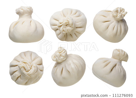 Set of khinkali closeup on a white background. 111276093