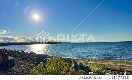the sun is setting over the stone beach the reflections Pacific Ocean is very quiet and calm there are no waves relaxing music background for titles and advertising Parksville beach Surfside RV resort the sun is setting over the stone beach the reflections Pacific Ocean is very quiet and calm there are no waves relaxing music background for titles and advertising Parksville beach Surfside RV resort 111277218
