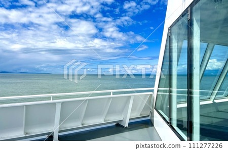blank for advertising travel on cruise liners on boats or yachts beautifully visible water Blue horizon Clear sky and calm sea on the Pacific Ocean or lake Canada to Vancouver Island Ferry blank for advertising travel on cruise liners on boats or yachts beautifully visible water Blue horizon Clear sky and calm sea on the Pacific Ocean or lake Canada to Vancouver Island Ferry 111277226