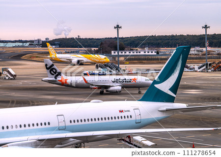 Chiba cityscape in Japan, view of Cathay Pacific, Jetstar, Scoot, etc. from Narita Airport 2 Chiba cityscape in Japan, view of Cathay Pacific, Jetstar, Scoot, etc. from Narita Airport 2 111278654