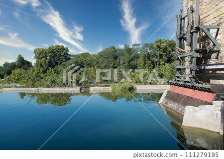 Serene River Flowing by Historic Water Mill in Ardeche Serene River Flowing by Historic Water Mill in Ardeche 111279195