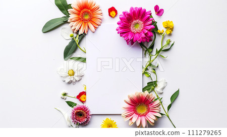 White blank greeting card on the white background with colorful flowers. White blank greeting card on the white background with colorful flowers. 111279265
