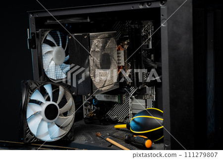 Close-up of a PC cooling system, a dirty radiator from a computer Close-up of a PC cooling system, a dirty radiator from a computer 111279807
