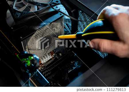Close-up of a PC cooling system, a dirty radiator from a computer 111279813