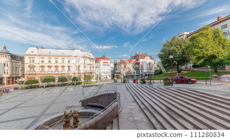 Panorama showing Sulkowski Castle and fountain on Chrobry Square in Bielsko-Biala timelapse, Poland. 111280834