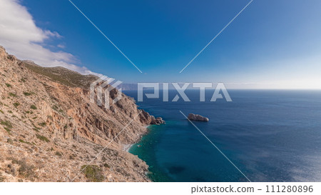 The Hozoviotissa Monastery standing on a rock over the Aegean sea in Amorgos island timelapse hyperlapse, Greece. The Hozoviotissa Monastery standing on a rock over the Aegean sea in Amorgos island timelapse hyperlapse, Greece. 111280896
