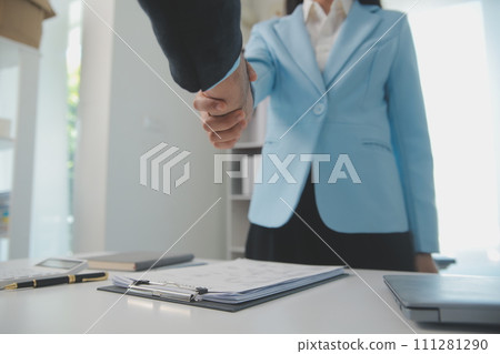 Close up view of job interview in office, focus on resume writing tips, employer reviewing good cv of prepared skilled applicant, recruiter considering application, hr manager making hiring decision Close up view of job interview in office, focus on resume writing tips, employer reviewing good cv of prepared skilled applicant, recruiter considering application, hr manager making hiring decision 111281290