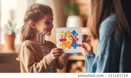 A cute little girl gives card with a picture of colored puzzles to a friend. Generated AI 111281720