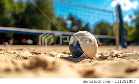AI-generated content. An old worn volleyball on the sand near the volleyball net under a clear blue sky. Outdoor beach volleyball sports competition 111281807