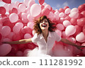 A Symphony of Joy: Young Woman Releasing Myriad Pink Balloons in a Spirited Celebration of Happiness 111281992