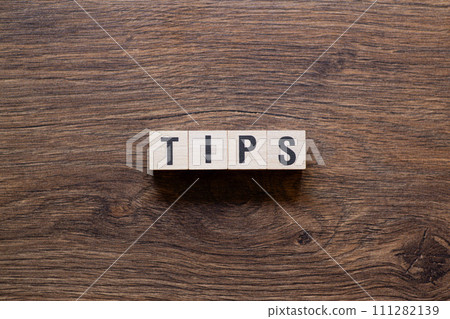 Tips - word concept on building blocks, text Tips - word concept on building blocks, text 111282139