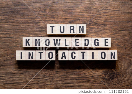 Turn knowledge into action - word concept on building blocks, text 111282161