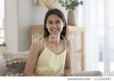 Portrait of attractive woman smile look at camera Portrait of attractive woman smile look at camera 111282981