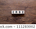 Erbe - herbal,word concept on building blocks, text 111283002