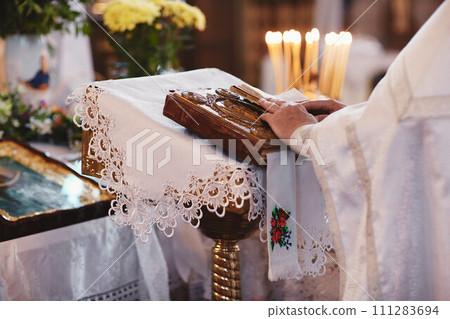 Bible on altar table. Faith and religion concept. Preaching background. Church interior. Lord's table concept. Holy holidays and Christmas concept. Christianity tradition. Bible on altar table. Faith and religion concept. Preaching background. Church interior. Lord's table concept. Holy holidays and Christmas concept. Christianity tradition. 111283694