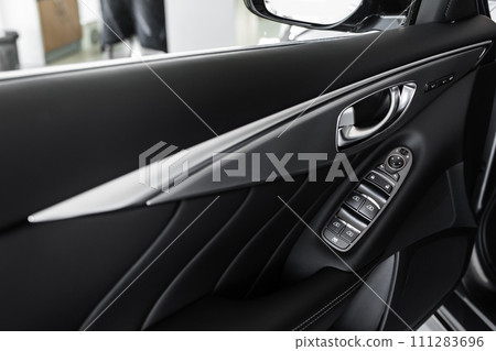 windows control panel. details of stylish car interior, leather interior 111283696