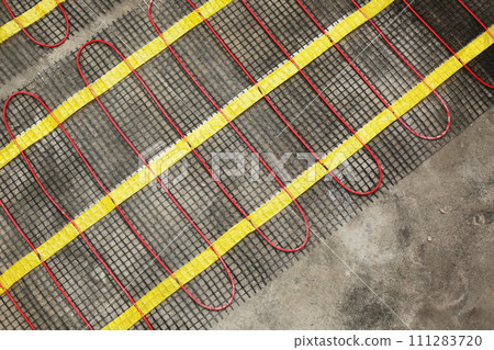 Installation of underfloor heating for thermal comfort using conduction radiation and convection. Close on the water system full interior heating. Individual heating. 111283720