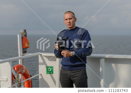 Seaman with sextant on navigational bridge Seaman with sextant on navigational bridge 111283743