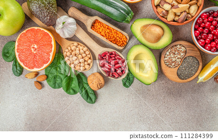 Different vegetables, seeds and fruits. Healthy food clean eating concept. Top view 111284399