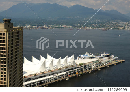 Vancouver, BC Canada Overlooking downtown Vancouver from Top of Vancouver Revolving Restaurant during sunset in summer 111284699