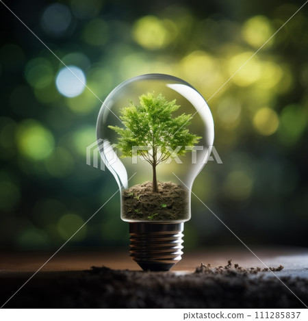 light bulb with a green sprout inside. green energy concept 111285837