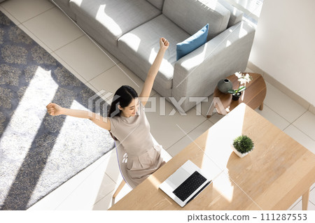 Happy Asian girl enjoying business achievement, education success 111287553