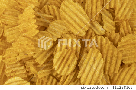 Corrugated potato chips. Chips as a screen saver, a beer snack. Corrugated potato chips. Chips as a screen saver, a beer snack. 111288165