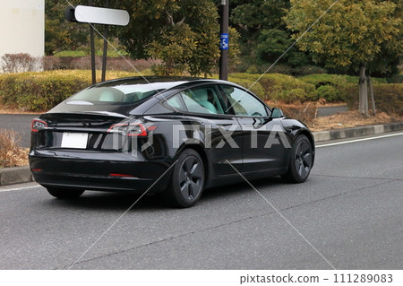 Image of an electric car running in the city Image of an electric car running in the city 111289083